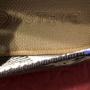 A pair of Rothy’s  cheetah print sneakers